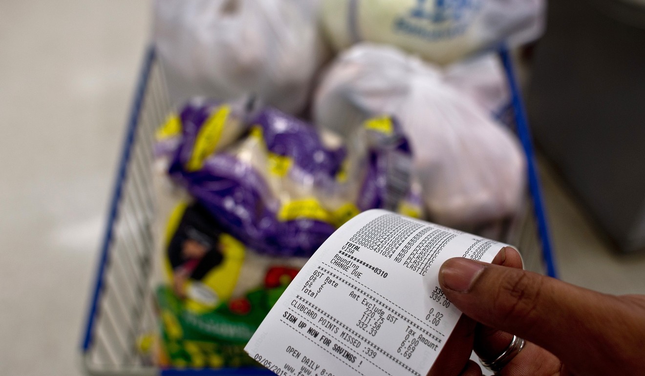 A grocery receipt at a department store in Kuala Lumpur shows the six per cent goods and services tax – an issue that could yet sway voters. Photo: AFP 