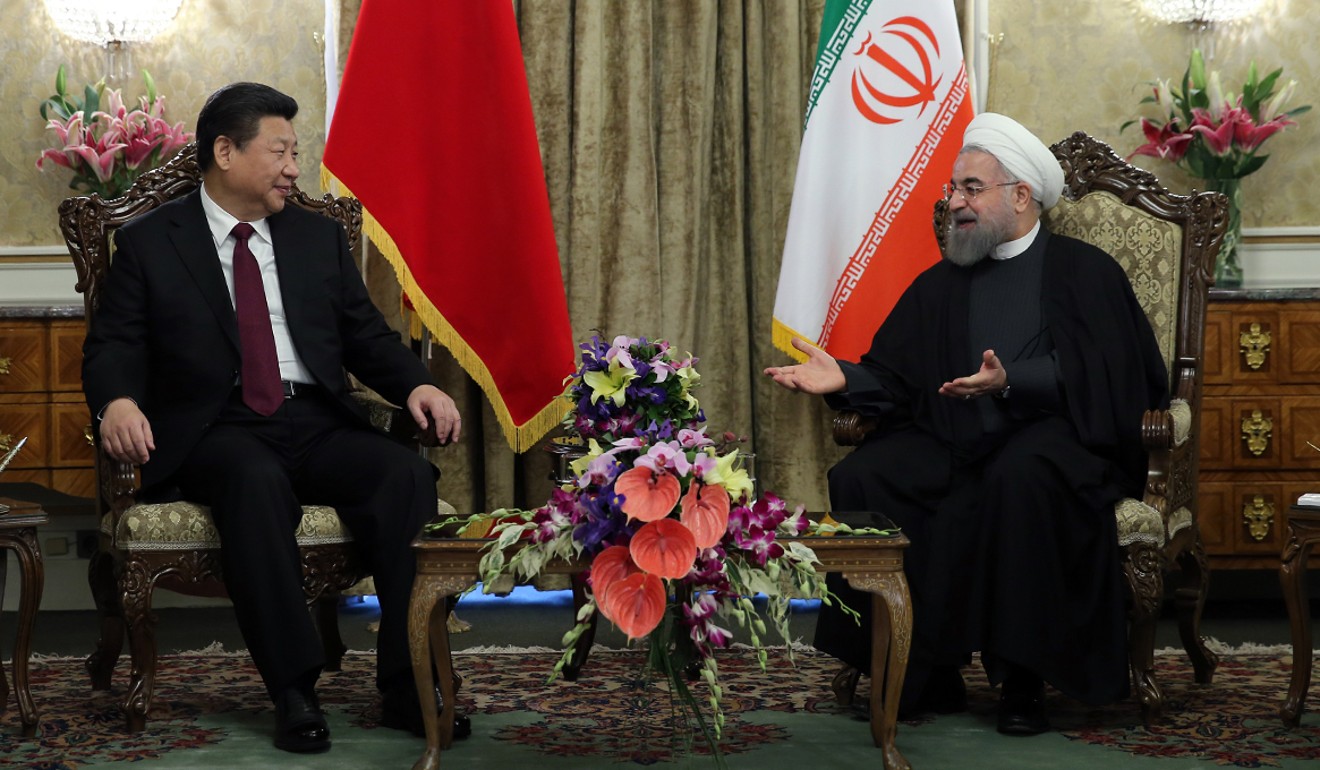 Iranian President Hassan Rouhani (right) meets Chinese President Xi Jinping in Tehran in January 2016. China is Iran’s largest trading partner. Photo: AFP 