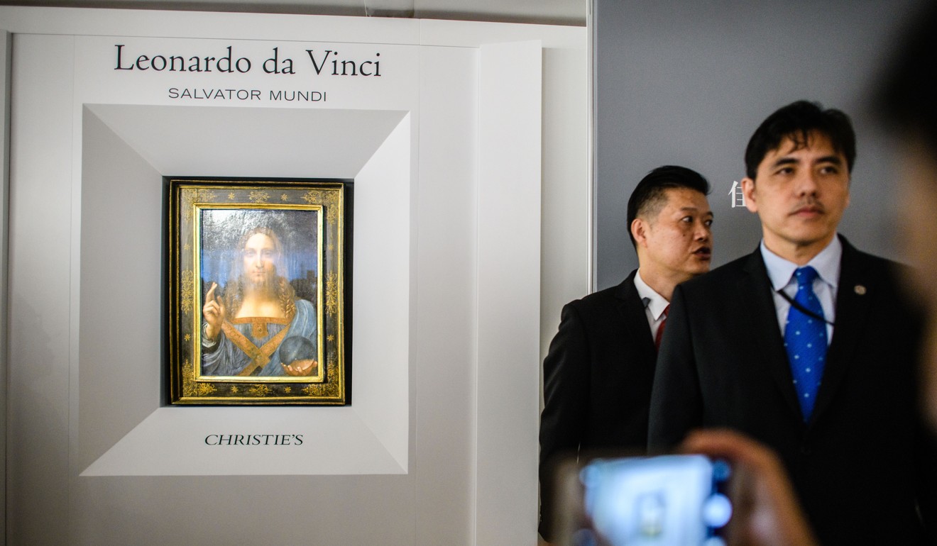 This picture taken on October 13, 2017, shows Jerry Chun Shing Lee at the unveiling of Leonardo da Vinci's “Salvator Mundi” painting at the Christie's showroom in Hong Kong. Photo: Agence France-Presse