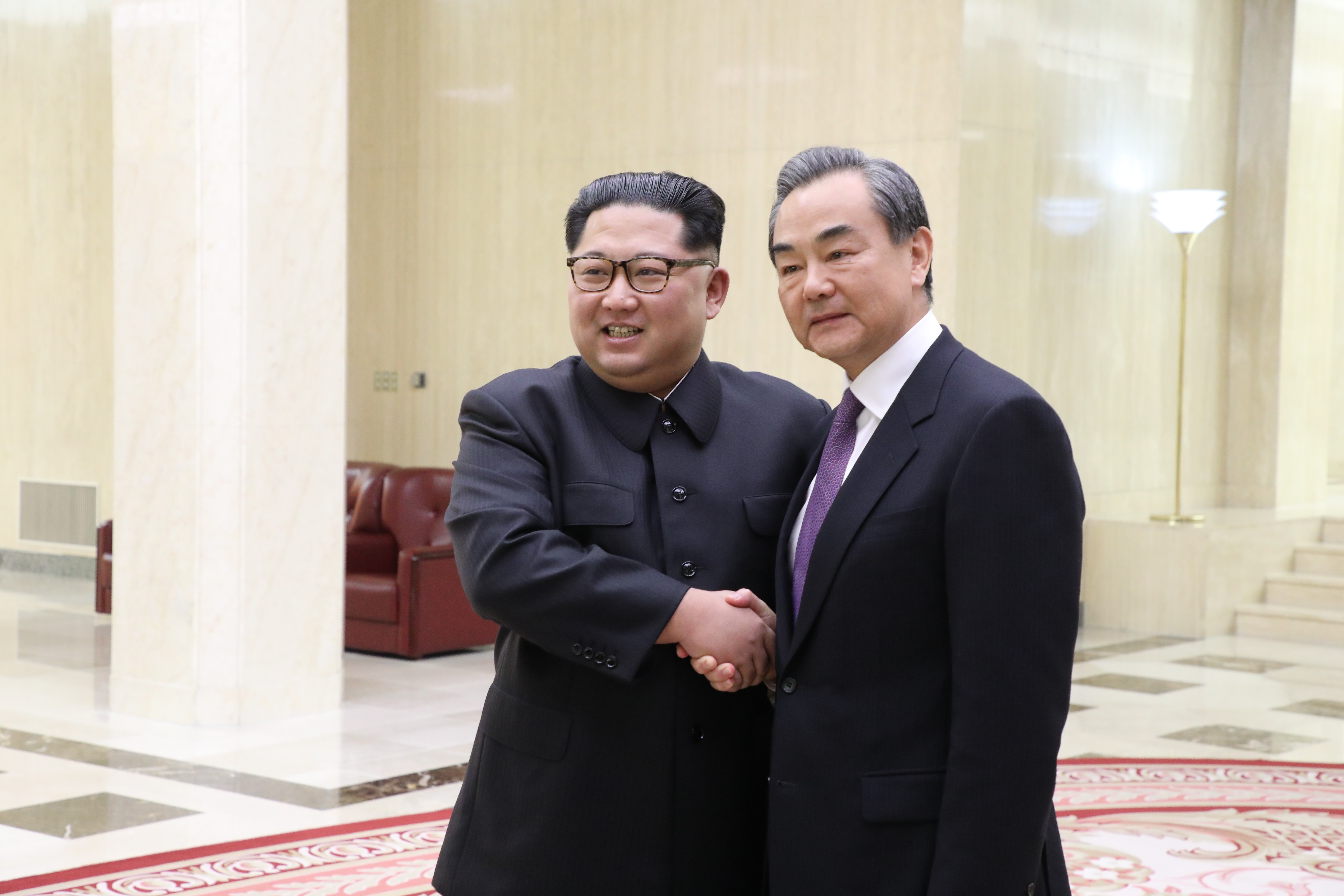 North Korean leader Kim Jong-un shakes hands with Chinese foreign minister Wang Yi in Pyongyang on May 3. Photo: Xinhua