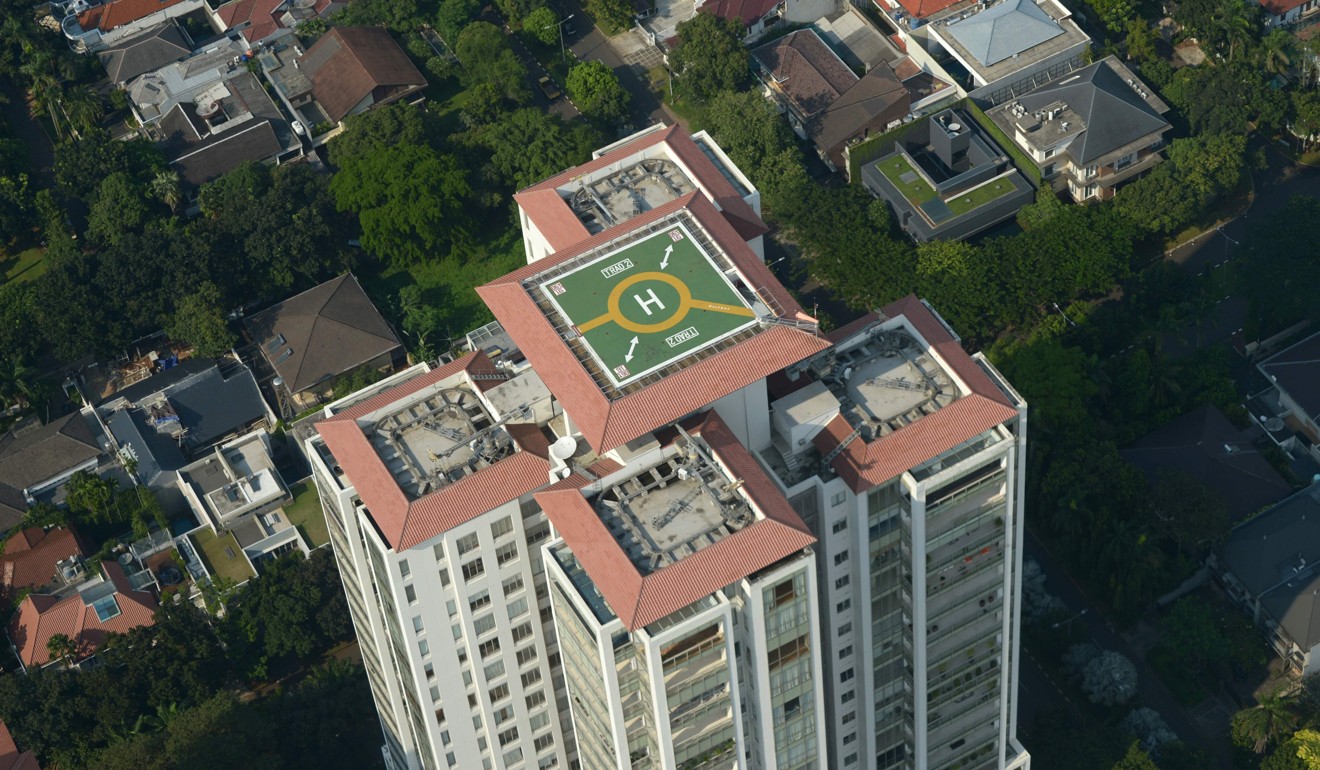 A helipad on a skyscraper in a photo taken from a Helicity taxi over Jakarta. Photo: AFP