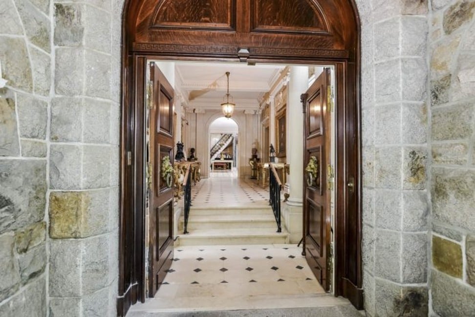 The grand entrance to the Newport mansion. Photo: Sotheby’s International Realty