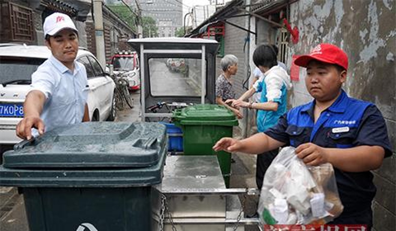Garbage trucks collect residents’ rubbish as part of the pilot scheme. Photo: Handout