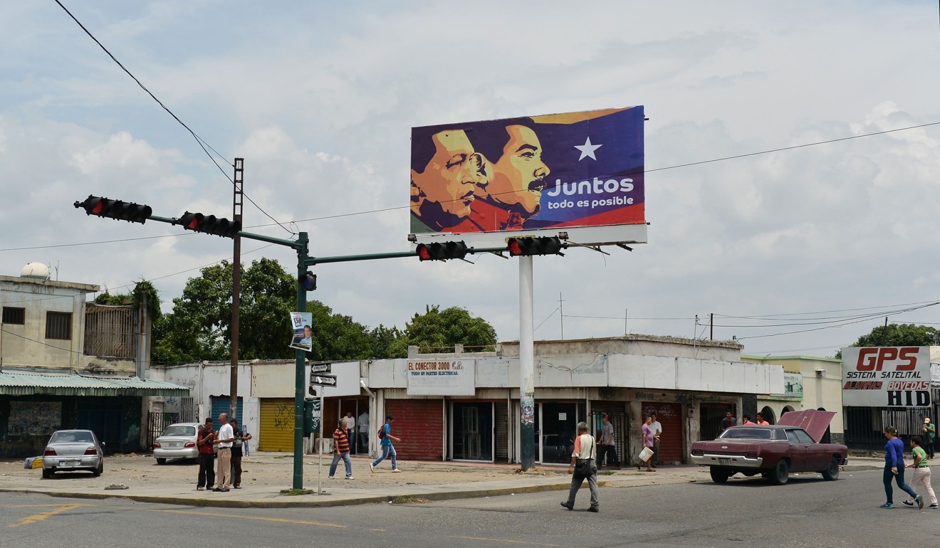 A billboard with Maduro and late president Hugo Chavez in Barquisimeto, Venezuela. Photo: AFP