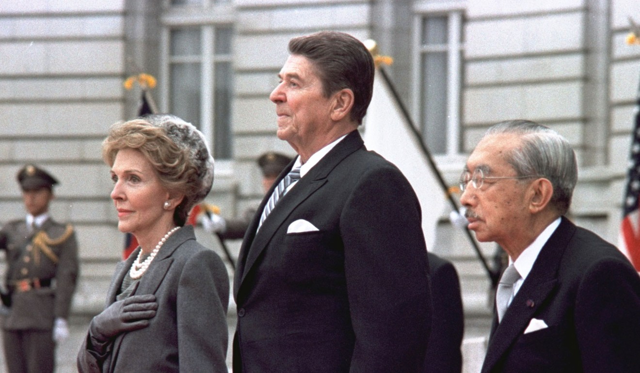 Robert Lighthizer played a pivotal role in negotiating two dozen trade deals with foreign nations when he was deputy trade chief to former US President Ronald Reagan (pictured centre with his wife Nancy and Japanese Emperor Hirohito in 1983). Photo: AP
