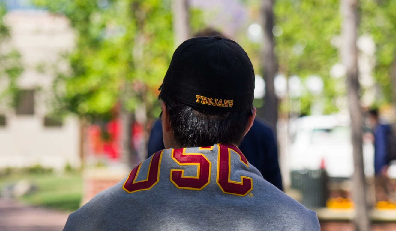 A student wearing a USC sweatshirt over his shoulders walks on the University of Southern California (USC) in Los Angeles, California on Thursday. Photo: Agence France-Presse