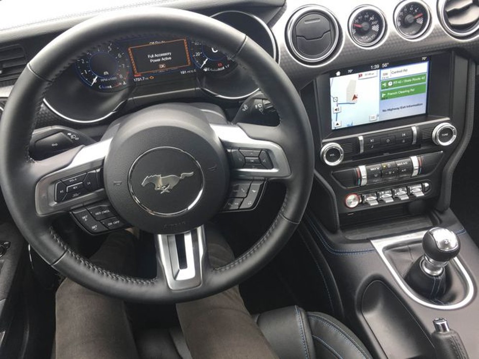 The interior of the Ford Mustang GT Fastback is basic, but well-executed and functional. The six-speed manual transmission provides all the excitement you will need. Photo: Bloomberg