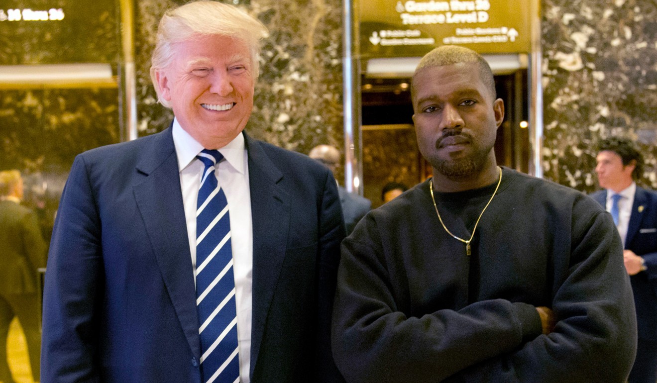 Then-President-elect Donald Trump and Kanye West, Kim Kardashian’s husband, pose for a picture in the lobby of Trump Tower in New York in December 2016. Photo: AP