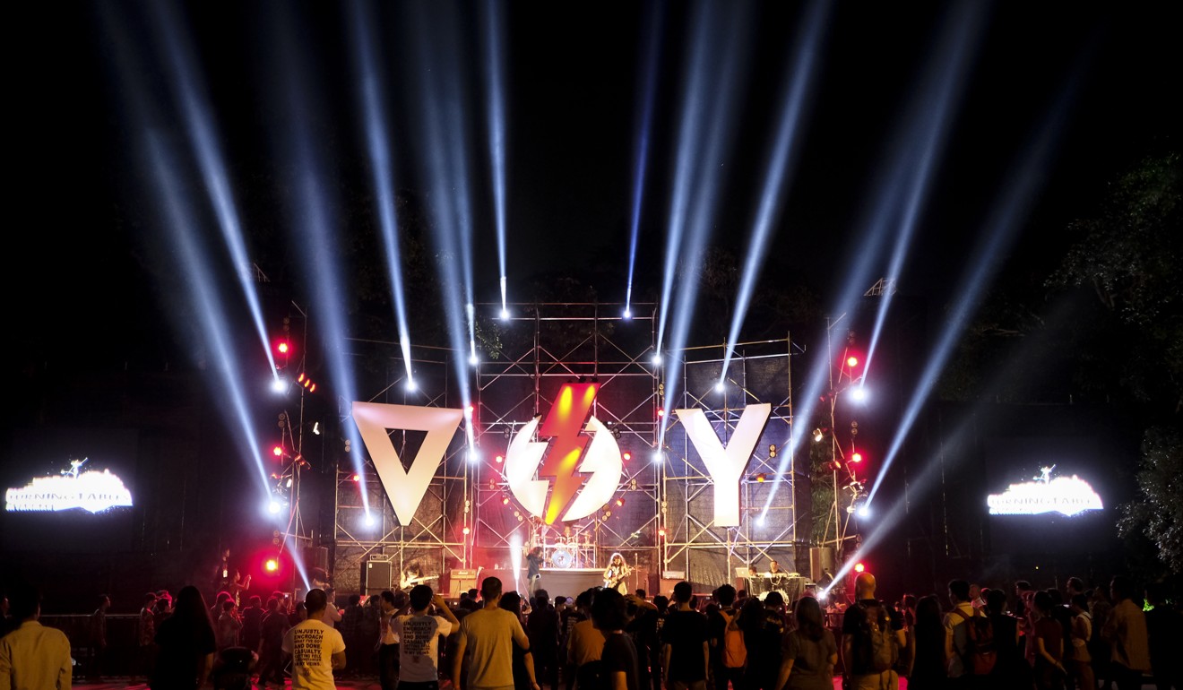 Music fans in Yangon enjoy a performance during the Voice of Youth 2017 festival at Kandawgyi Park, staged by a Danish NGO. Few alternative music promoters can afford to hire such venues. Photo: James Wendlinger