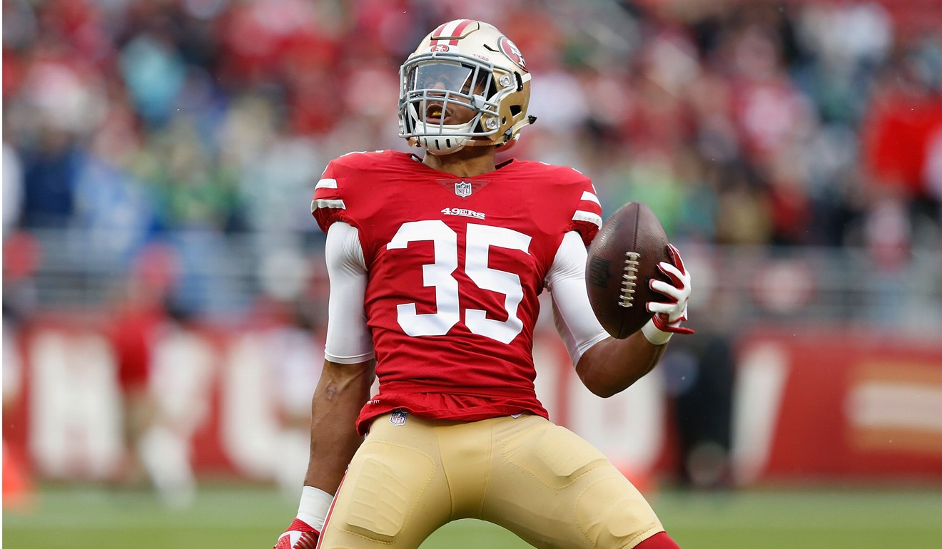 Eric Reid celebrates after intercepting a pass against the Seattle Seahawks at Levi’s Stadium. Photo: AFP