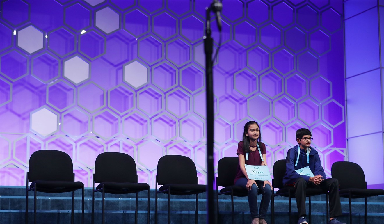 Naysa Modi (left) and Karthik Nemmani, both from Texas, are the last two competitors in the 91st Scripps National Spelling Bee on Thursday. Photo: Agence France-Presse
