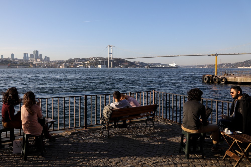 Istanbulites watch on as an oil tanker crosses the Bosphorus. Opponents of the Kanal Istanbul project claim its environmental toll, in the pristine parts of the city, is too heavy to ignore and has not been studied properly. Photo: Hélène Franchineau