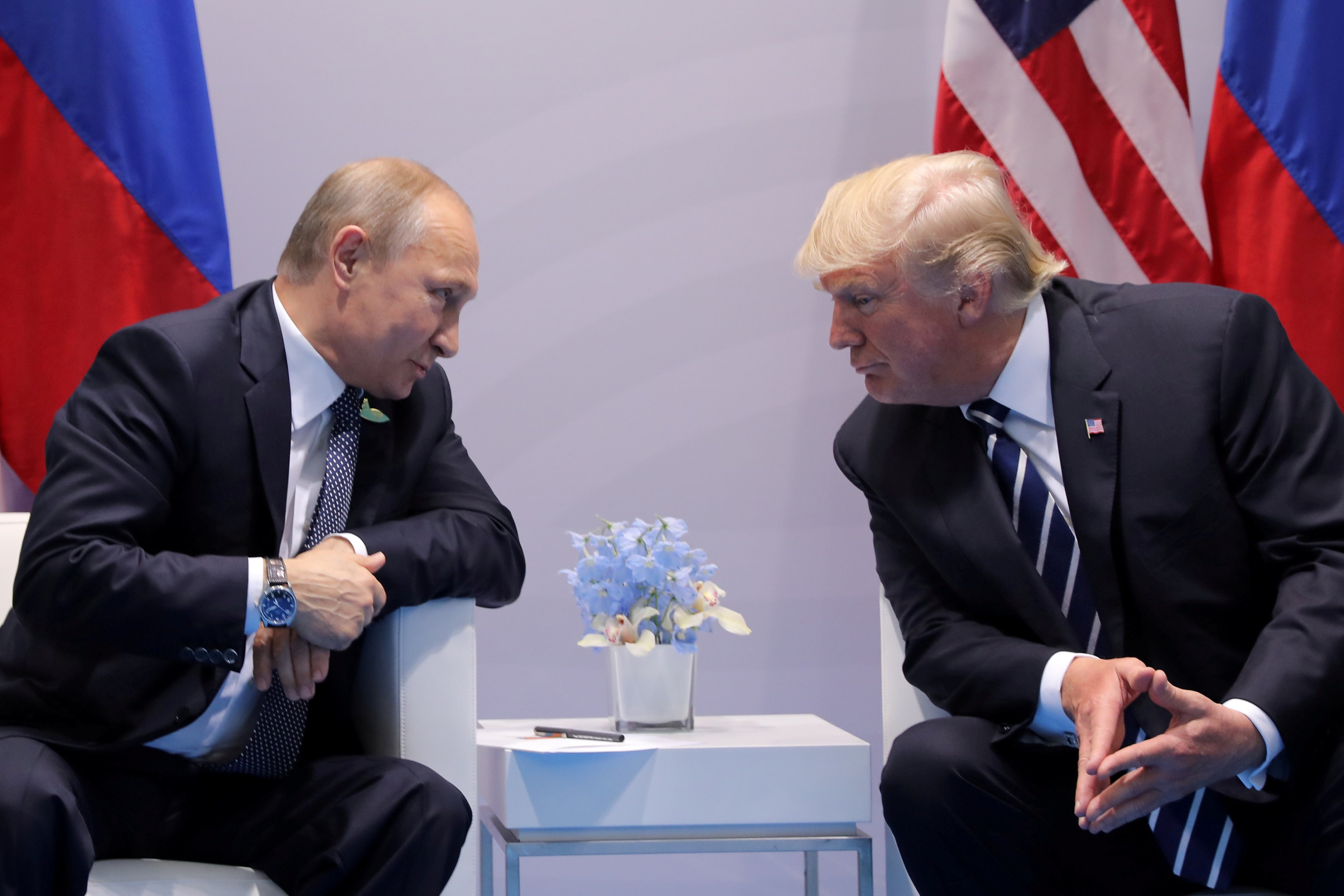 Russian President Vladimir Putin talks to US President Donald Trump during their bilateral meeting at the G20 summit in Hamburg, Germany, in July 2017. Both leaders are known for enthusiastically promoting their versions of the truth. Photo: Reuters
