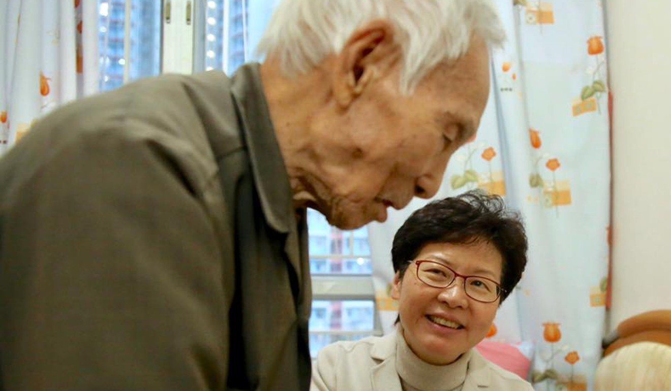 Chief Executive Carrie Lam Cheng Yuet-ngor and the Third Side convenor Tik Chi-yuen visited Ngan Fook, an elderly man living in a care home. She has been visiting Ngan in the run-up to Chinese New Year since 2003. Photo: Facebook