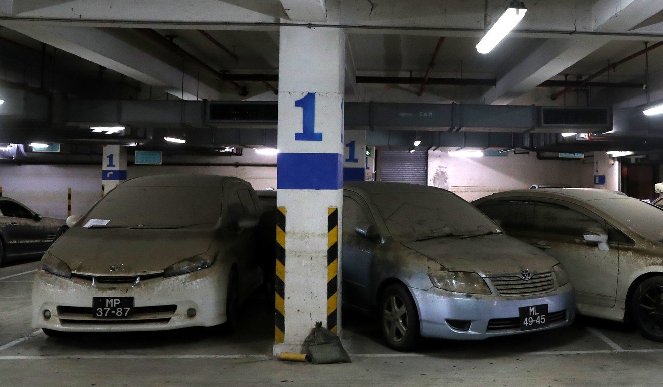 Amid a lack of parking spaces, concern has been raised over damaged cars still present in the city. Photo: K.Y. Cheng