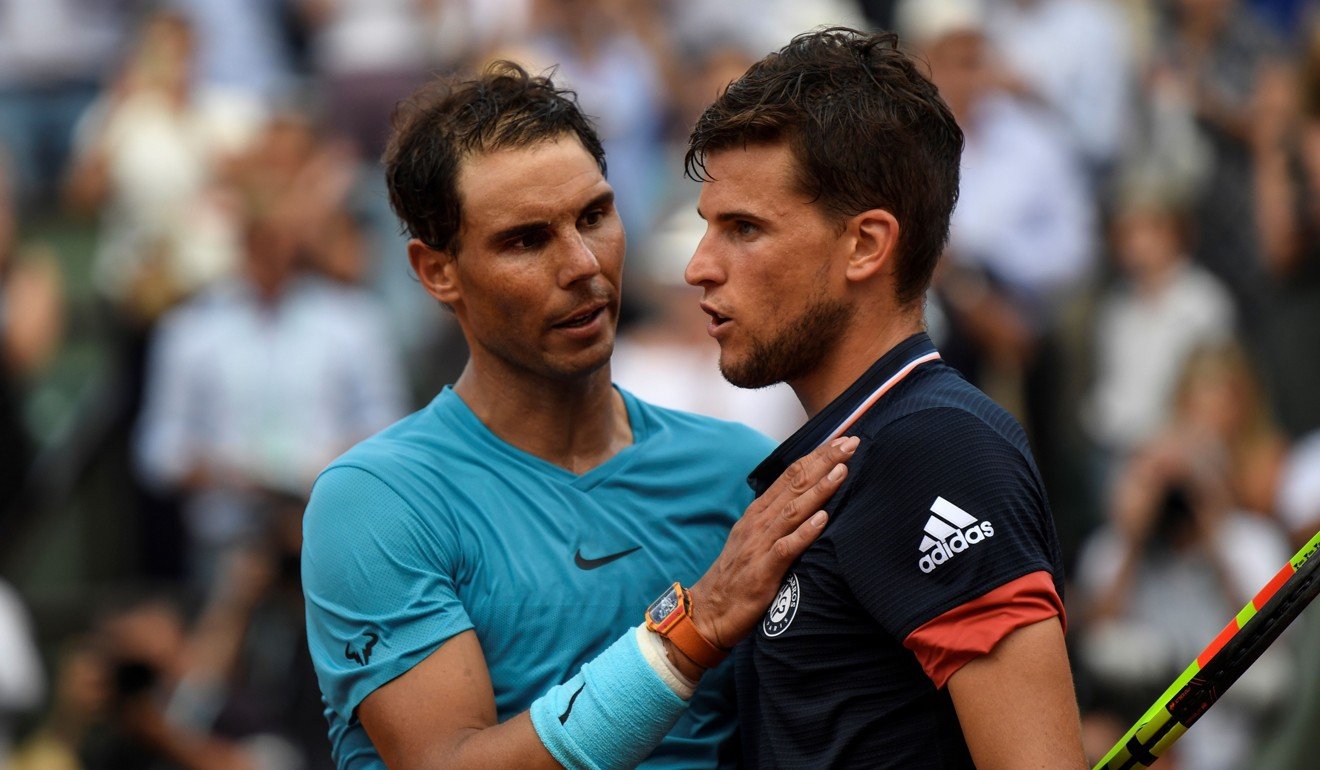 Rafael Nadal embraces Austria's Dominic Thiem after victory at the end of their men's singles final. Photo: AFP