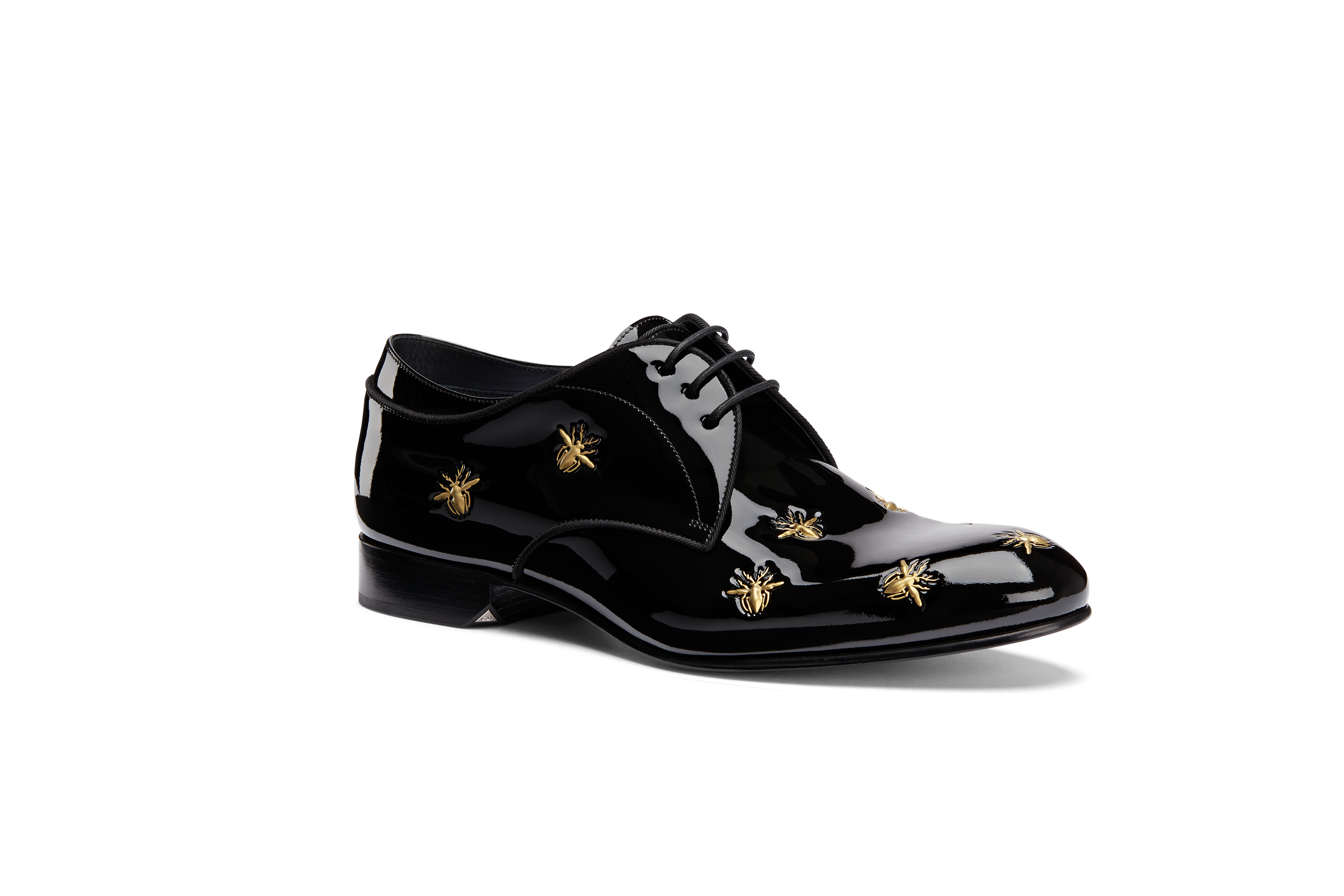 Dior. With gold-tone bee embroidery, this pair of black patent calfskin Derbies with grosgrain edging details is a great choice for celebration, HK$8,000