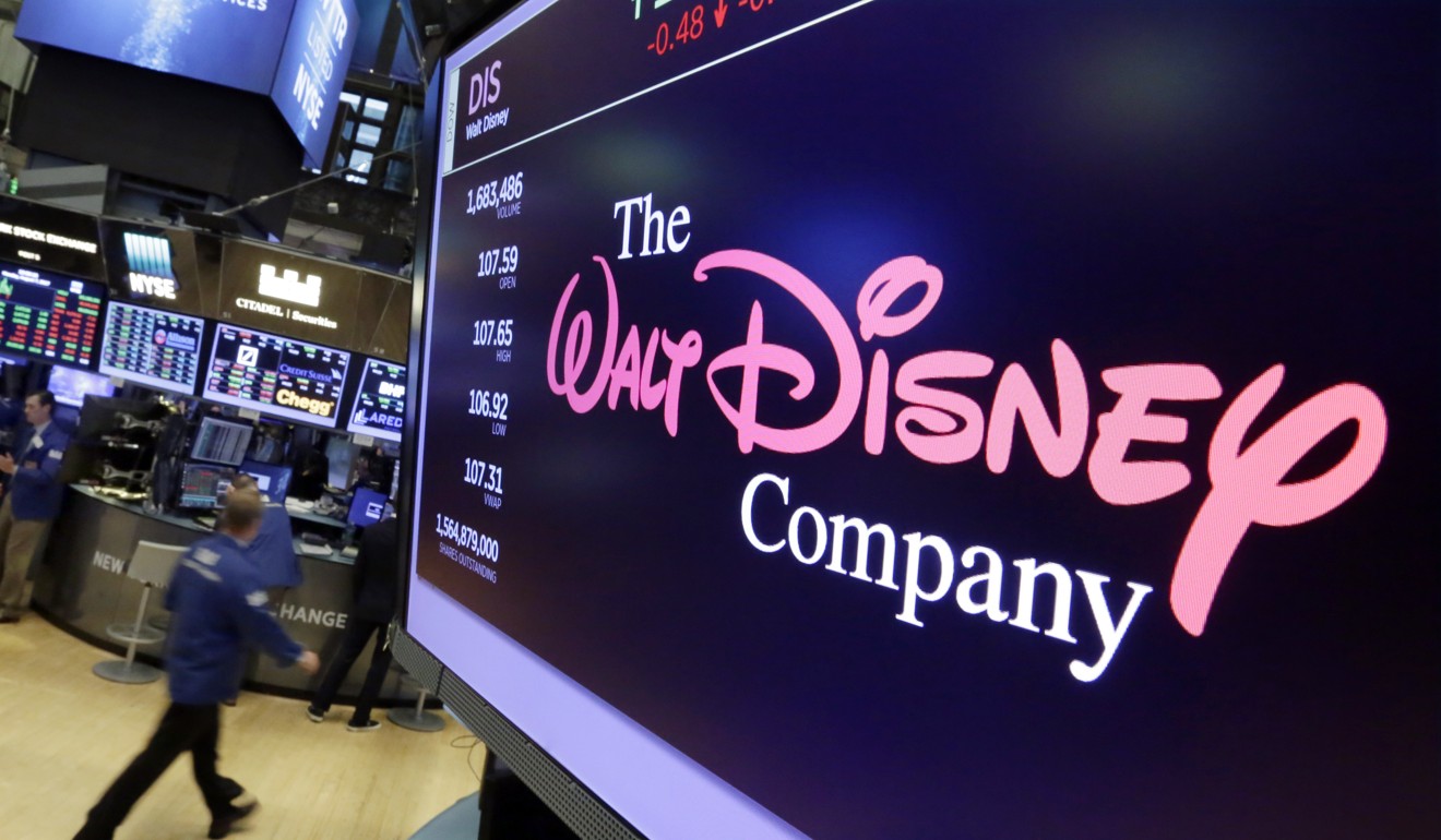 The Walt Disney Co logo on a screen above the floor of the New York Stock Exchange. Disney finds itself in a bidding war against Comcast for 21st Century Fox. Photo: AP