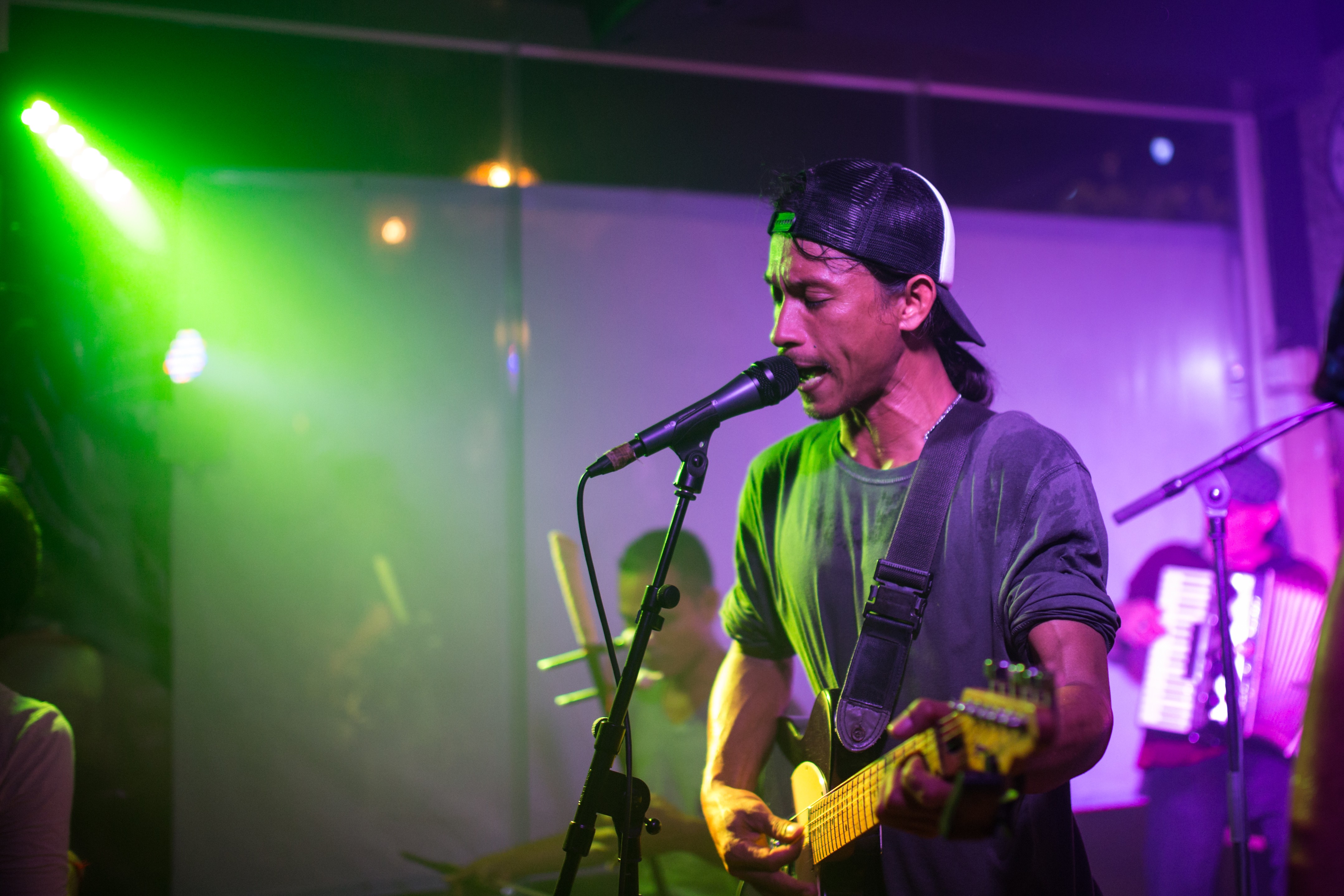 Singer and guitarist Uk Sochiet of Kampot Playboys on stage in the Cambodian capital Phnom Penh. Photo: Steve Porte