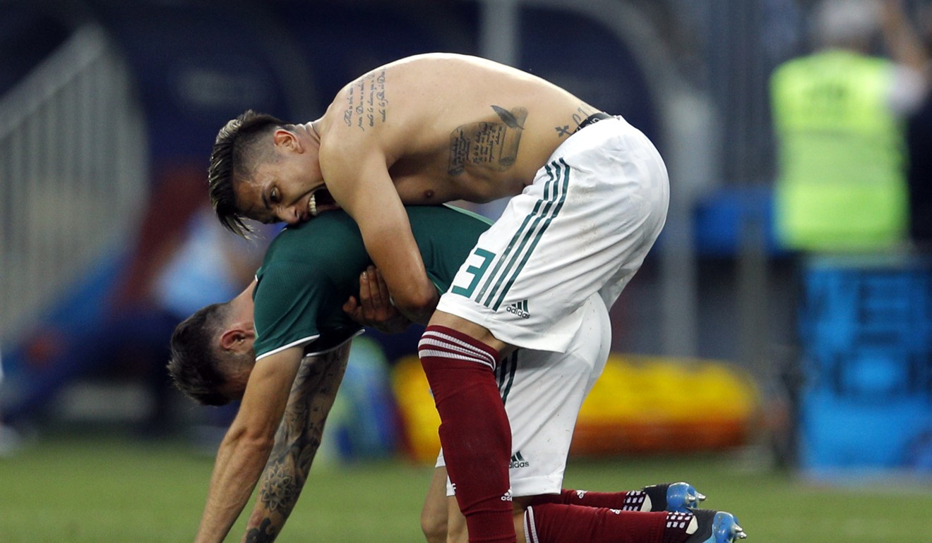 Mexico's Carlos Salcedo and Miguel Layun celebrate at the end of the group F match. Photo: AP