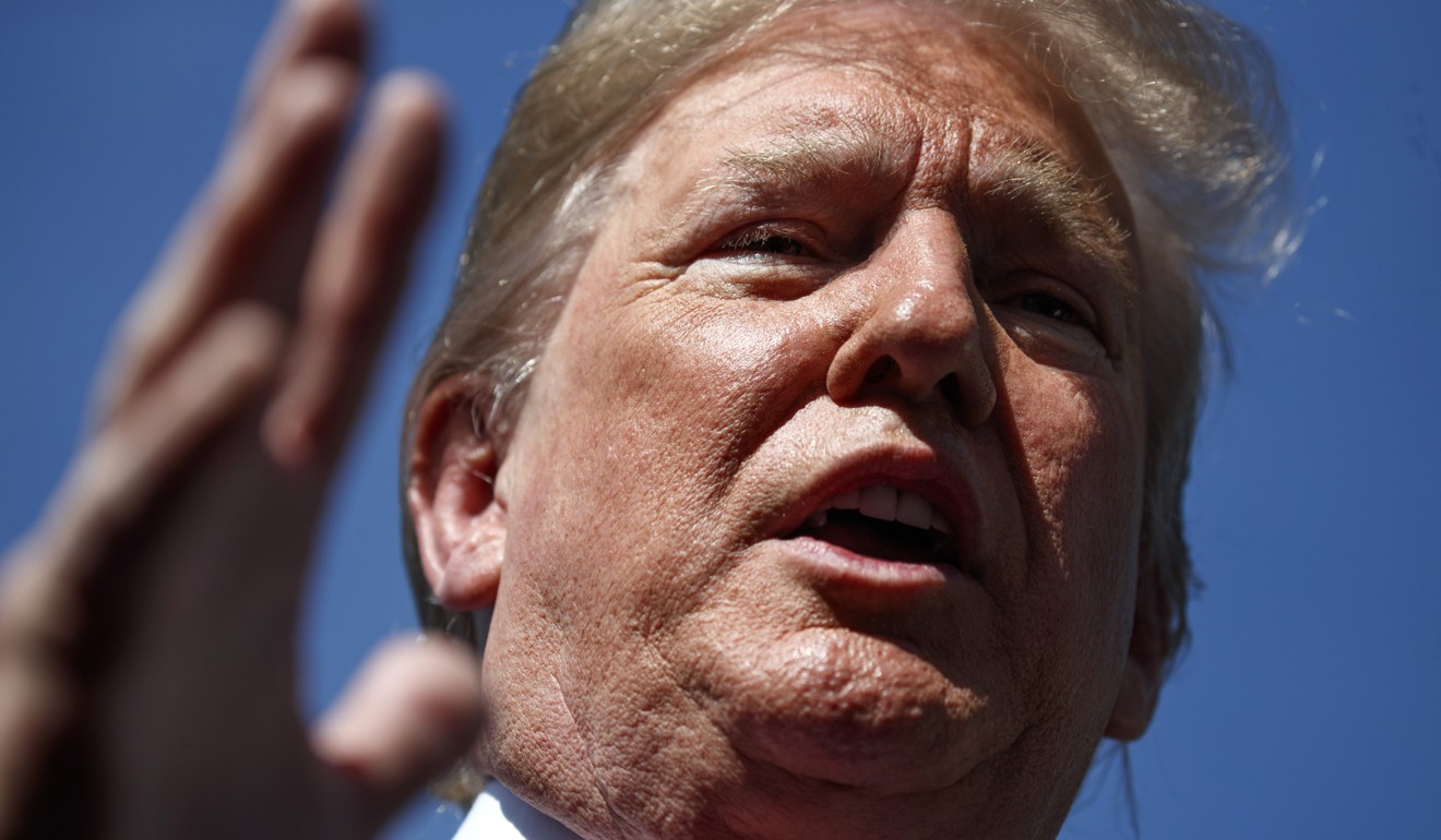 US President Donald Trump has vowed additional duties if China retaliates over US tariffs announced on Friday. Photo: AP