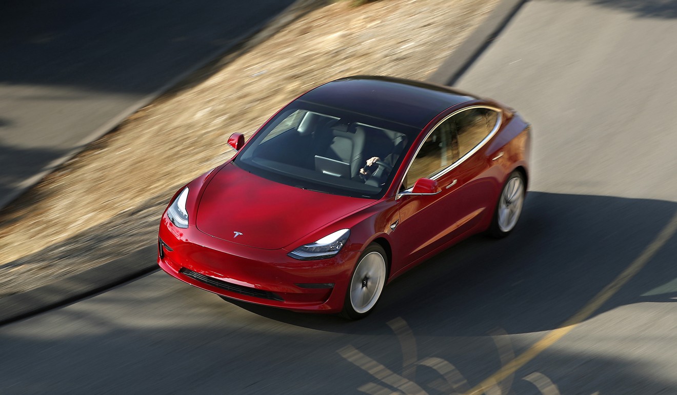 Tesla's Model 3 is taken for a test drive in Elysian Park in January. Photo: Los Angeles Times