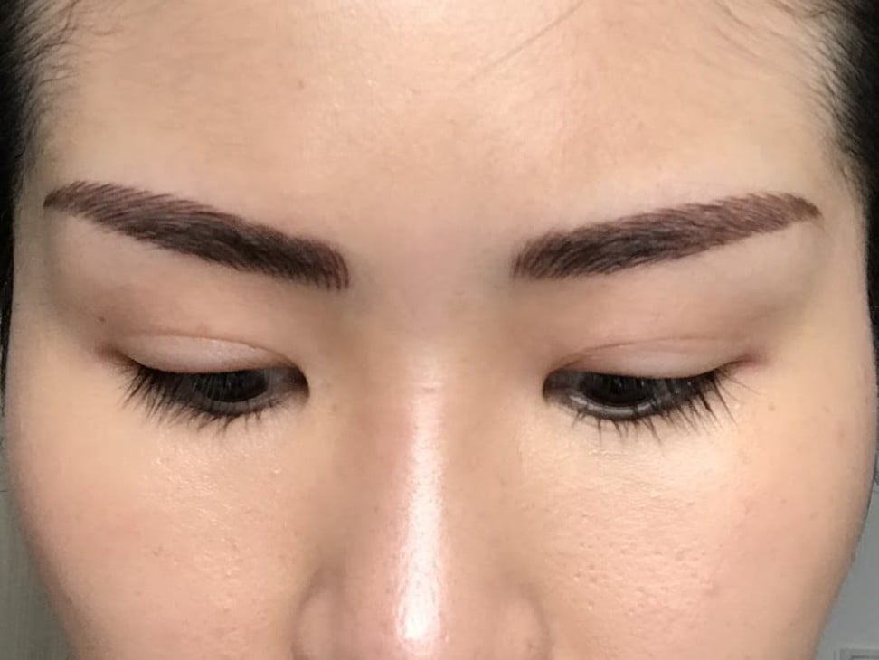 The writer’s eyebrows after microblading.