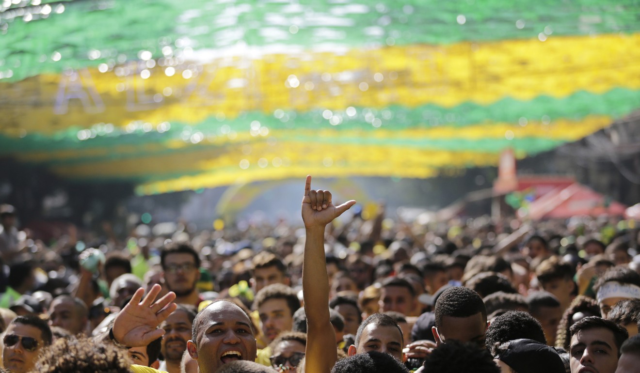 Brazilian soccer fans celebrate in Rio. Photo: AP