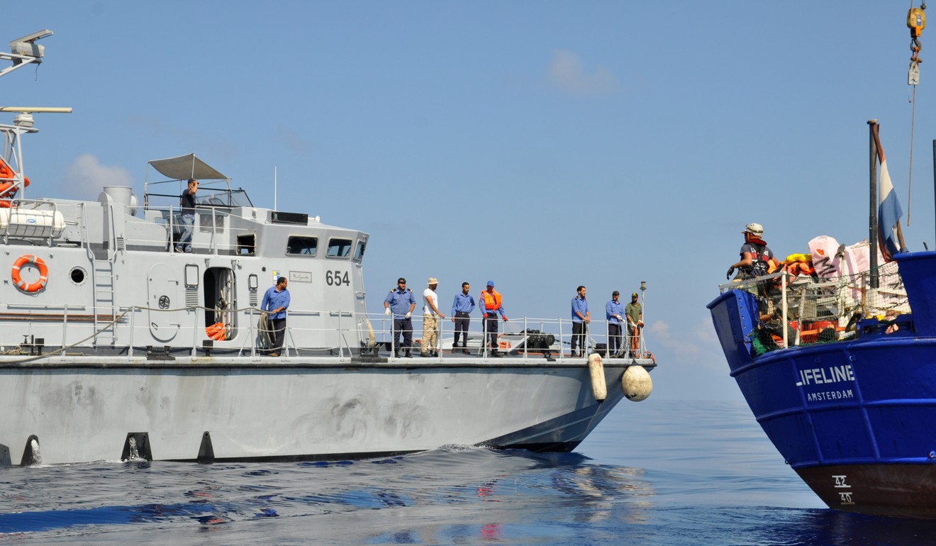 An Italian Coast Guard vessel approaching the Lifeline sea rescue boat on June 21, 2018. Photo: AFP/Mission Lifeline
