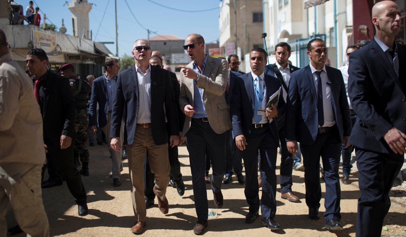 Britain's Prince William gestures during a visit at Jalazone refugee camp near Ramallah, in the occupied West Bank, on Wednesday. Photo: pool via Reuters