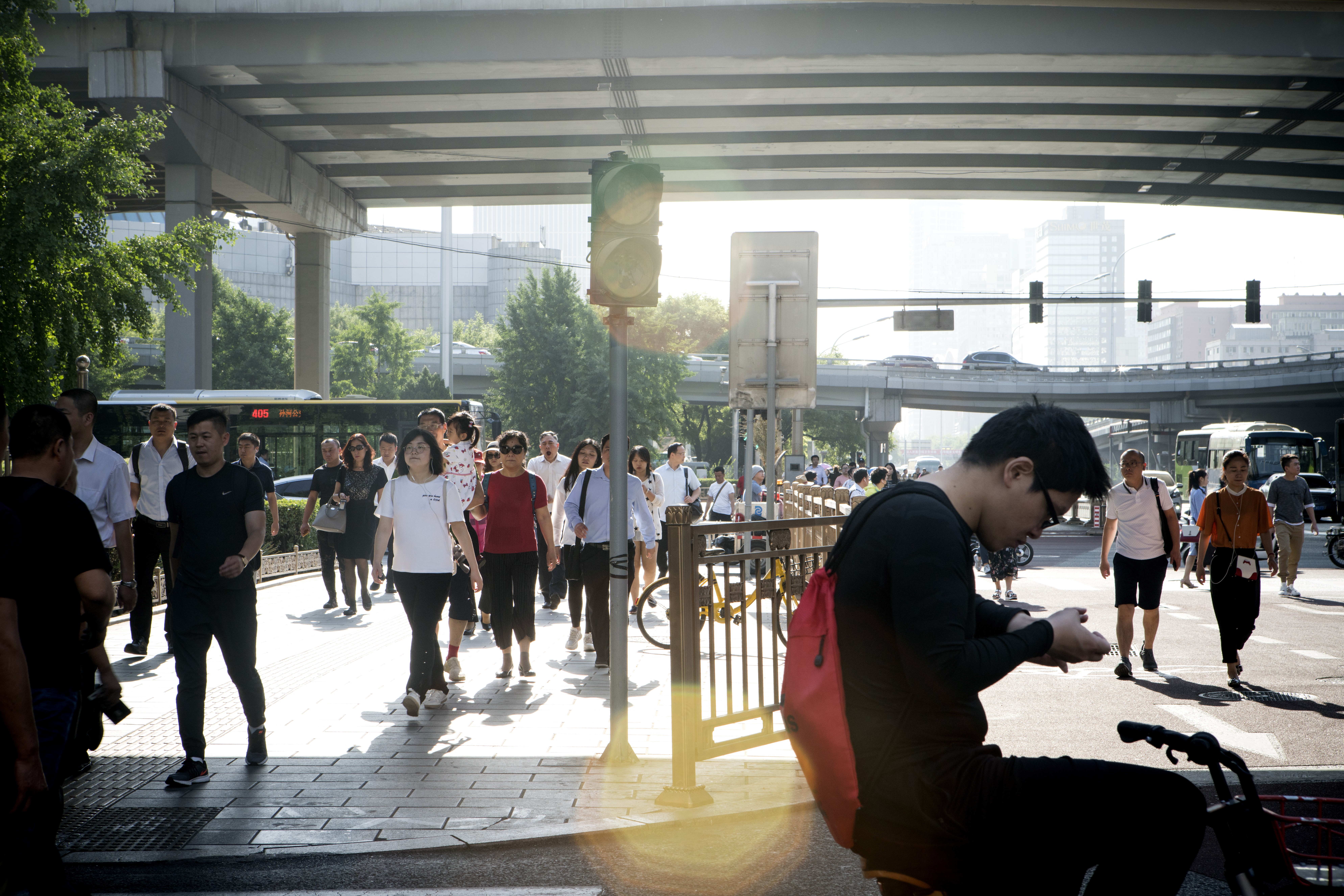 Pedestrians in Beijing’s central business district. Sun Life Everbright Life Insurance has increased its footprint across China since 2010, obtaining licences for 22 provinces and municipal cities. Photo: Bloomberg