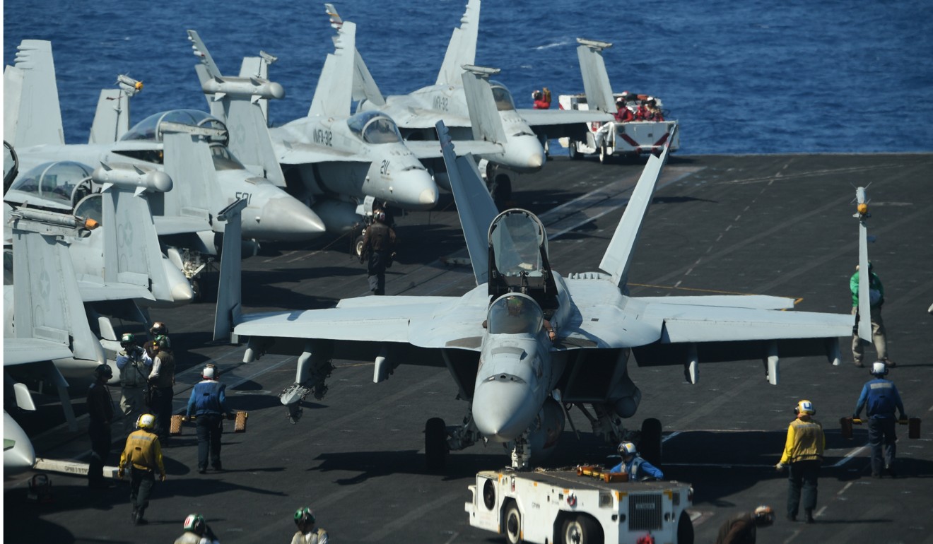FA-18 Hornet jets aboard the US aircraft carrier Theodore Roosevelt in the South China Sea. Photo: AFP