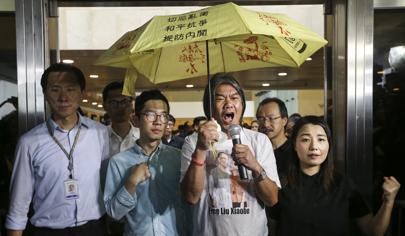 The disqualification of several lawmakers including Edward Yiu Chung-yim (left), Nathan Law Kwun-chung, Leung Kwok-hung and Lau Siu-lai was one of the reasons listed for this year’s protest. Photo: Sam Tsang