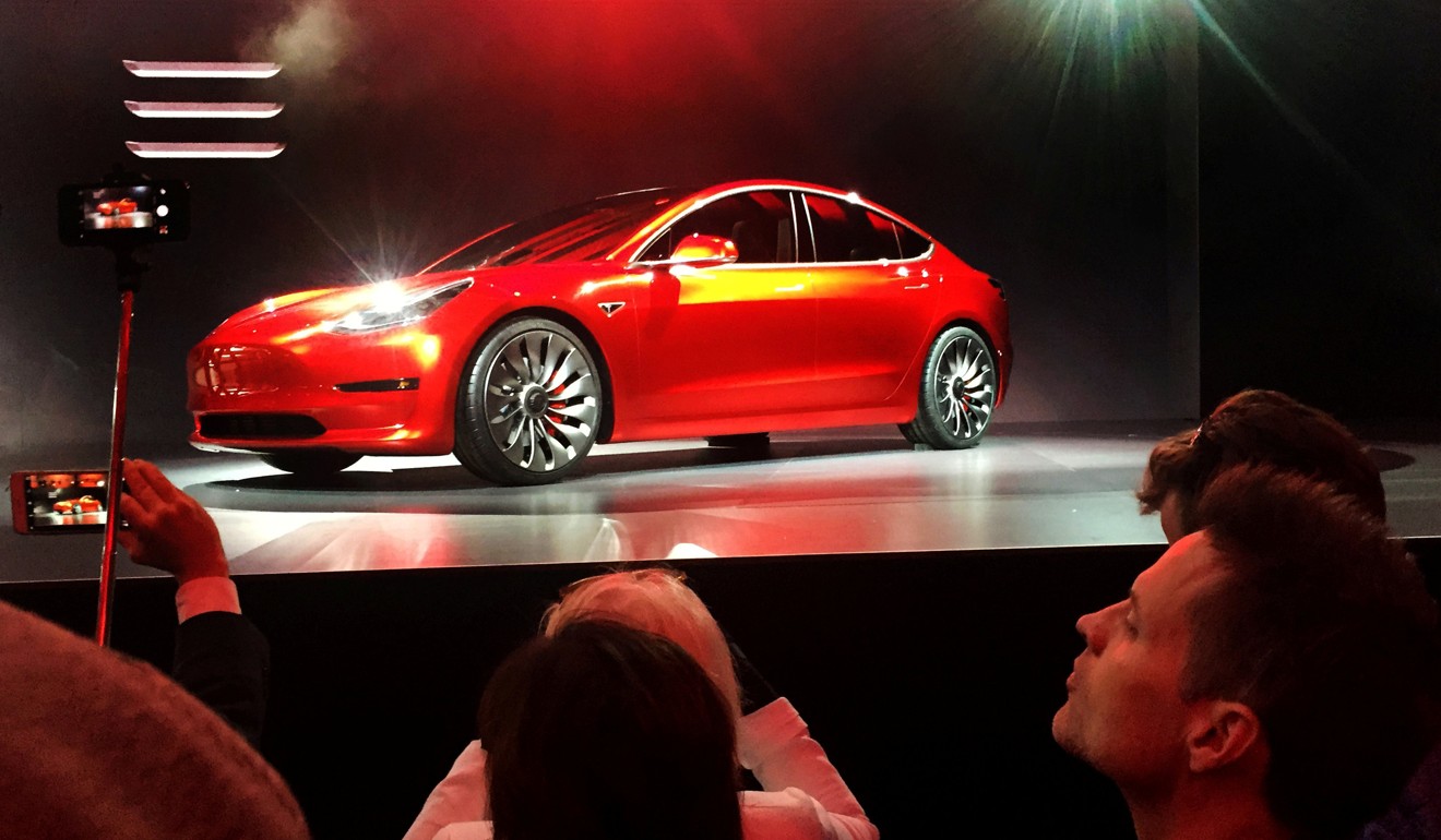 A Tesla Model 3 sedan, its first car aimed at the mass market, is displayed on March 31. Photo: Reuters
