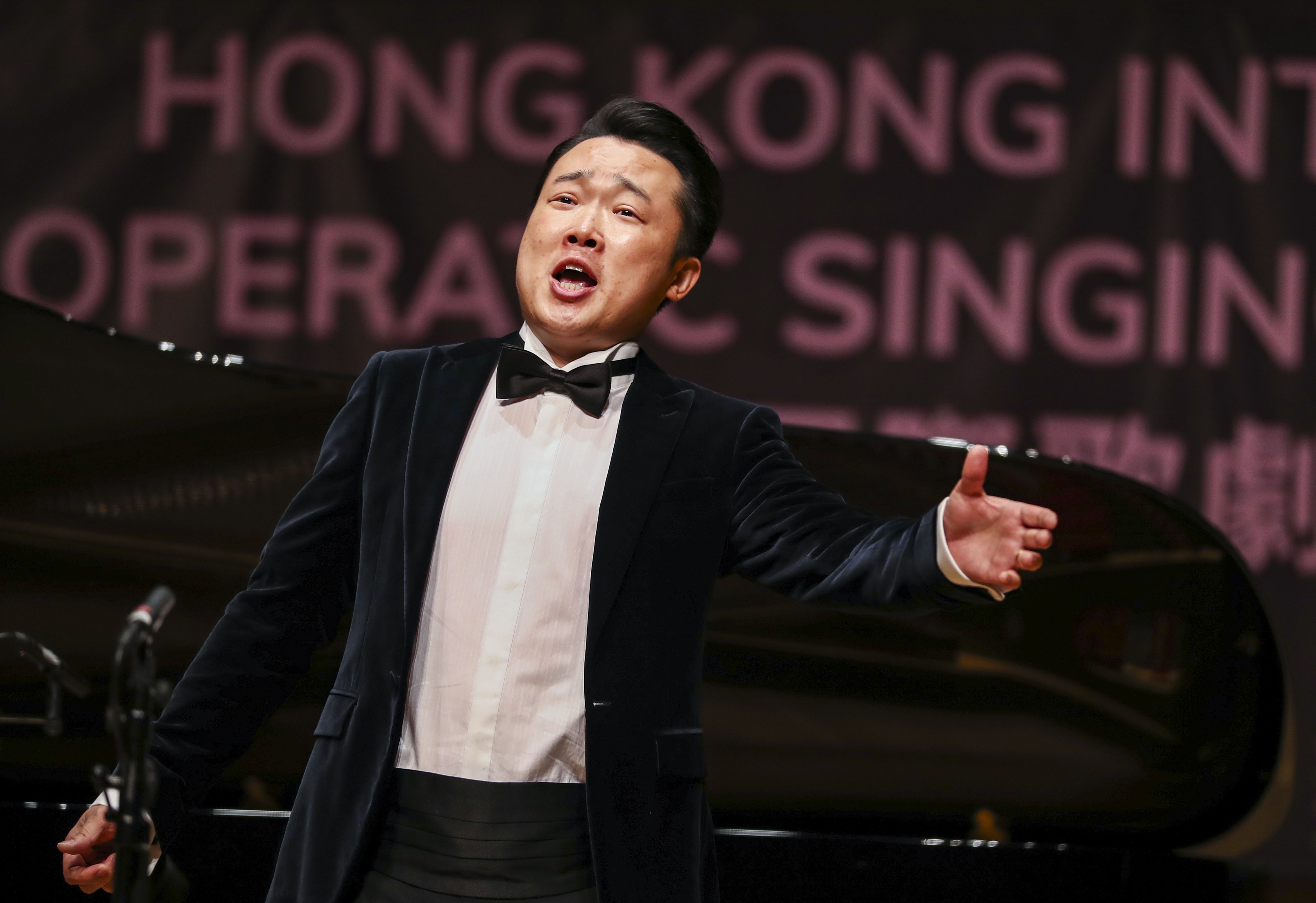 Hong Kong tenor Chen Yong performing during the semi-final round of the Hong Kong International Operatic Singing Competition held at City Hall in Central. Photo: Nora Tam