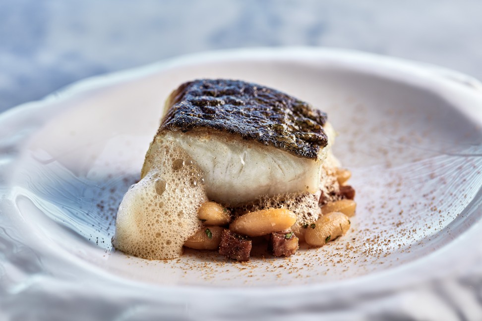 Pan-seared cod with coco beans and chorizo ragout from Felix, The Peninsula