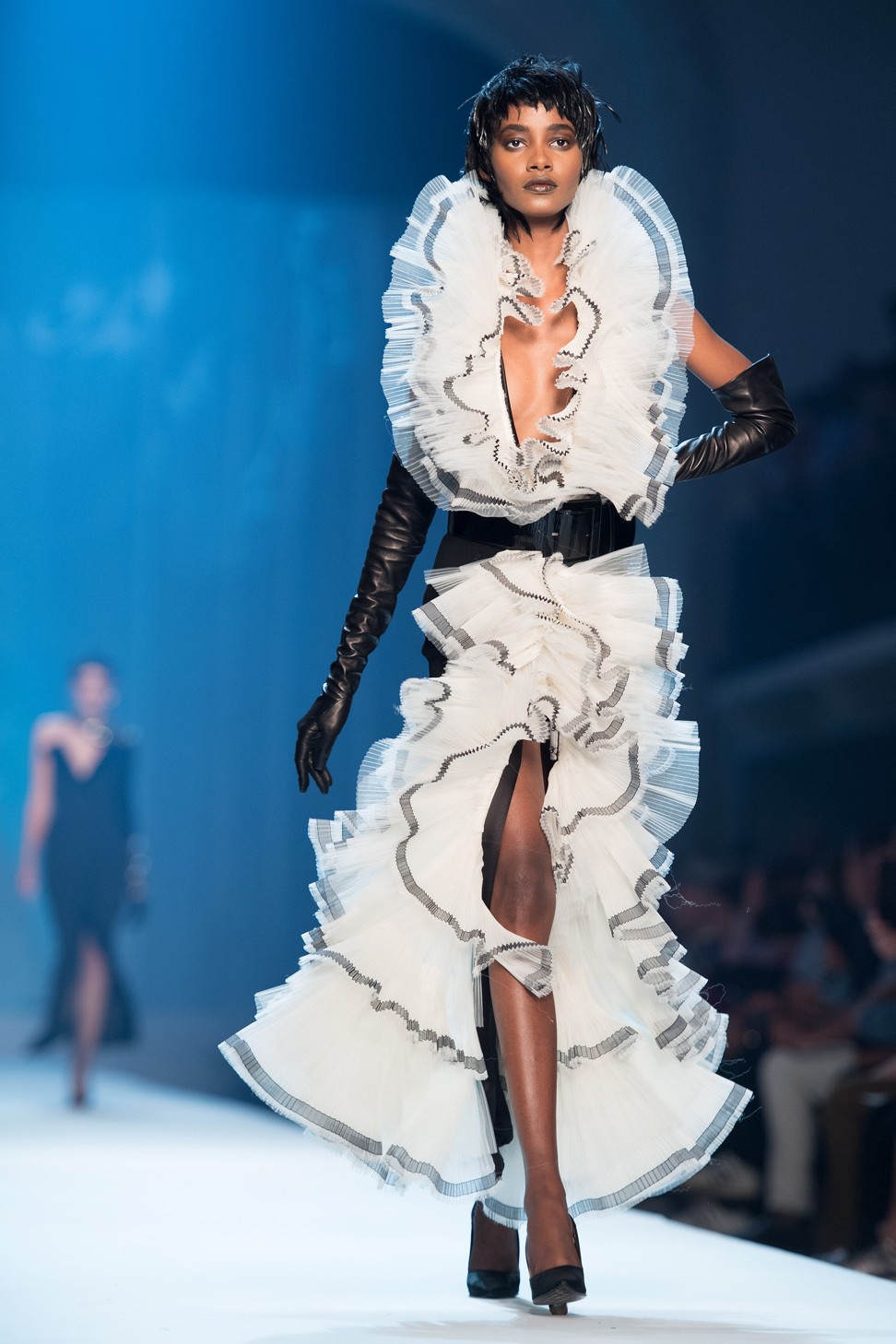 A model presents a look made of ruffles from the Haute Couture collection by French designer Jean-Paul Gaultier in Paris. Photo: EPA