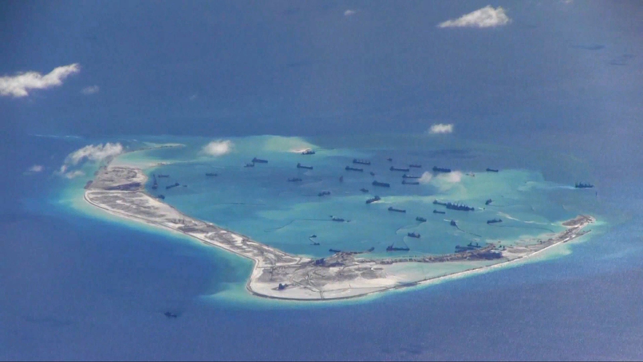 An aerial photo of Chinese dredging vessels purportedly seen in the waters around the disputed Spratly Islands in the South China Sea. Photo: Reuters