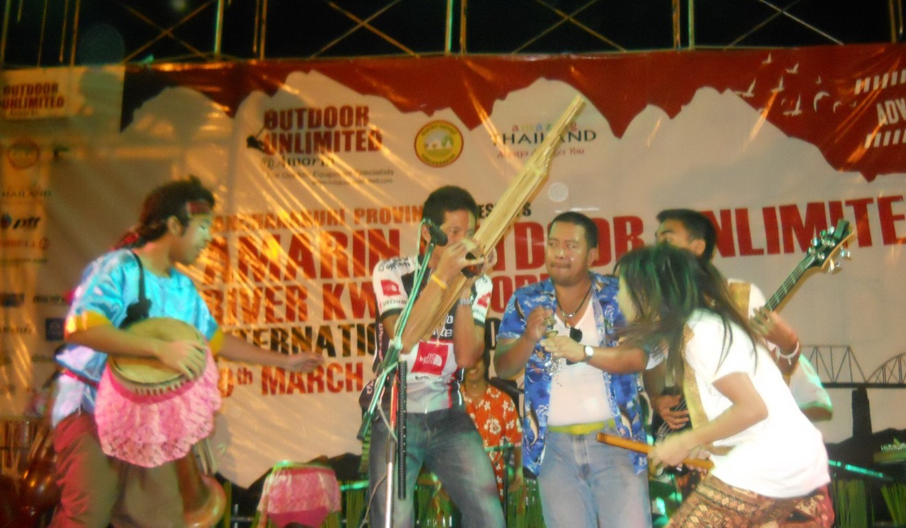 Saman Kunont runs up on stage to join the band. Photo: Handout