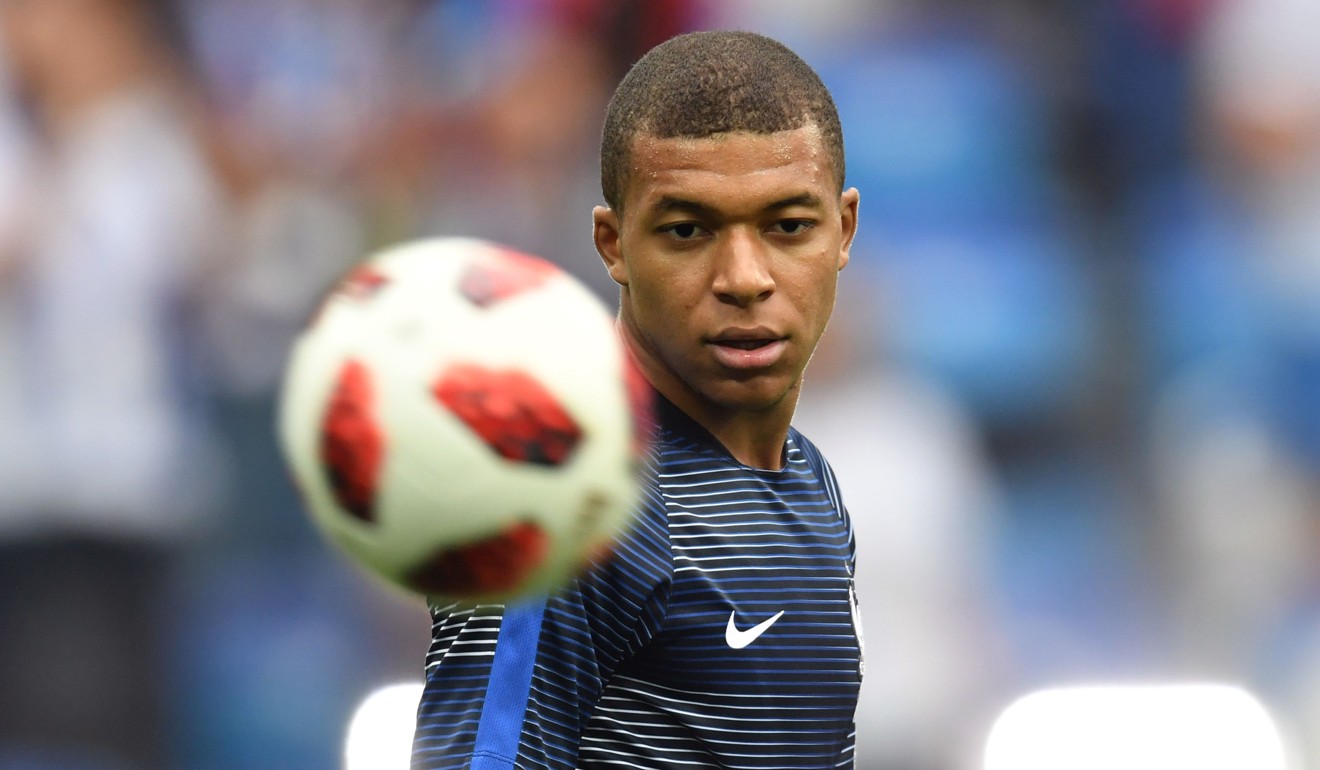 France forward Kylian Mbappe warms up before the quarter-final. Photo: AFP