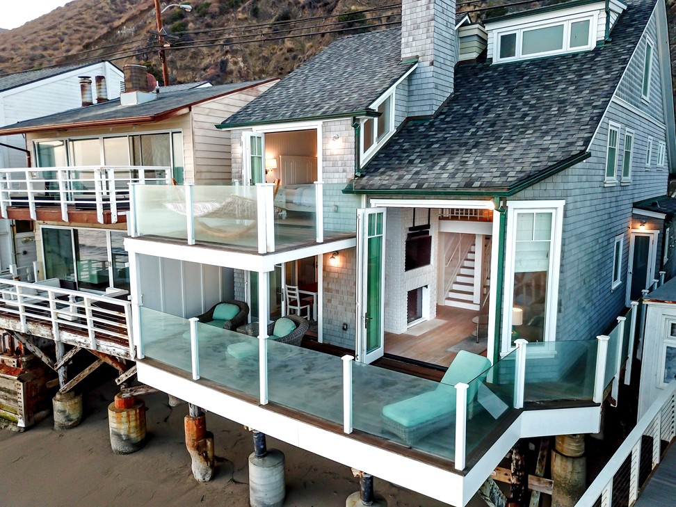 Ipe-wood decking and balconies make the most of unobstructed ocean views. Photo: Mark Hayward/TNS