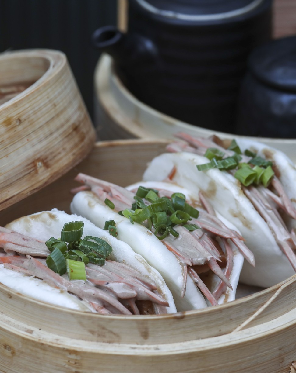 Char siu open buns, with tender and moist pork neck, and crunchy, tangy carrot slaw. Photo: Jonathan Wong