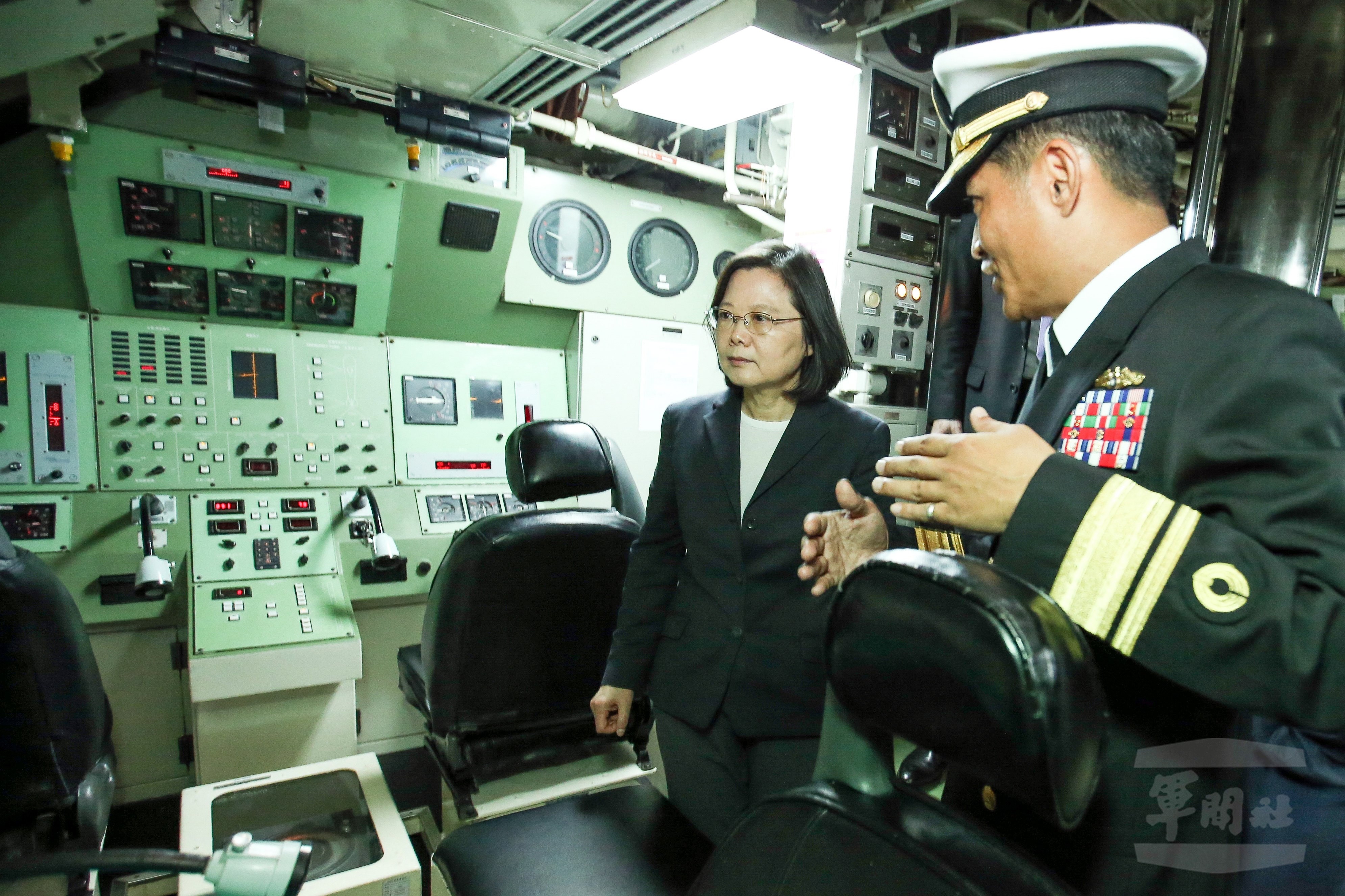 Taiwanese President Tsai Ing-wen inspects the inside of a submarine at the Zuoying naval base in Kaohsiung, Taiwan, in March last year. The Taiwanese government wants to build eight diesel-electric submarines to bolster its four outdated vessels. Photo: EPA / Taiwan Military News Agency handout