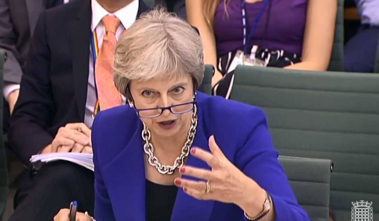 Supporters said that British Prime Minister Theresa May, shown in the House of Commons on Wednesday, would resume battling over Brexit strategies after the summer recess. Photo: UK Parliamentary Recording Unit via AFP