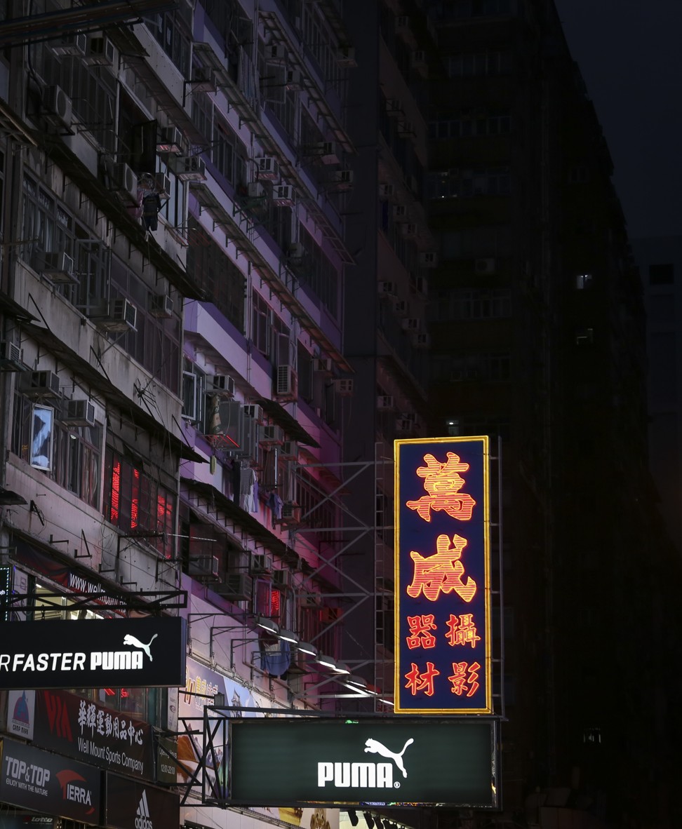 A surviving neon sign featuring Beiwei caligraphy. Thousands have been removed from Hong Kong streetscapes in the past 12 years, and others replaced by LEDs. Photo: Adonian Chan