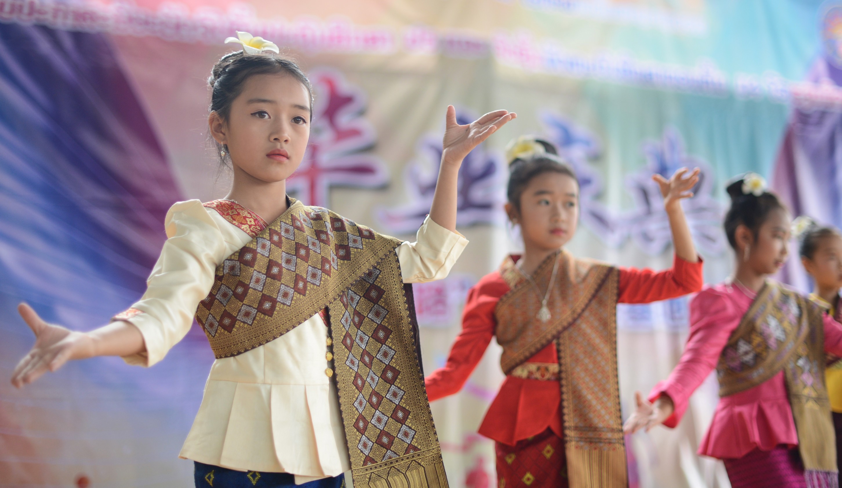 Girls dance at a graduation ceremony held at Mitthaphab School in Oudomxay Province, Laos. The school, founded in 2006, teaches both Chinese and Laotian. As China’s infrastructure spending in Southeast Asian nations grows, the US could ramp up its provision of education, health and finance services in the region. Photo: Xinhua