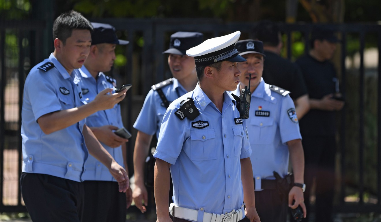 Chinese police stand outside the US embassy in Beijing on Thursday after a blast near the embassy premises. Photo: AFP