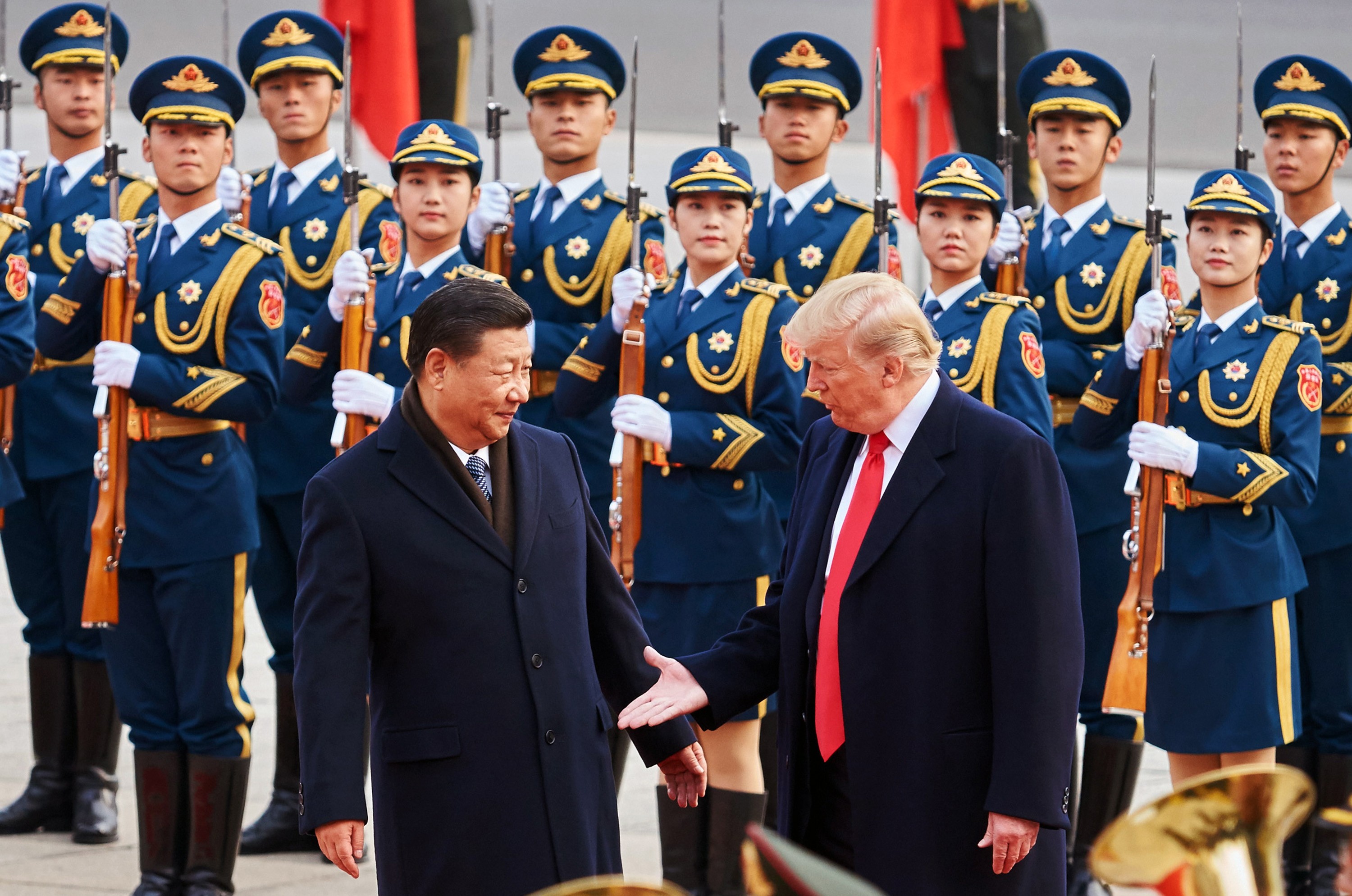China's President Xi Jinping and US President Donald Trump outside the Great Hall of the People in Beijing. Photo: TNS