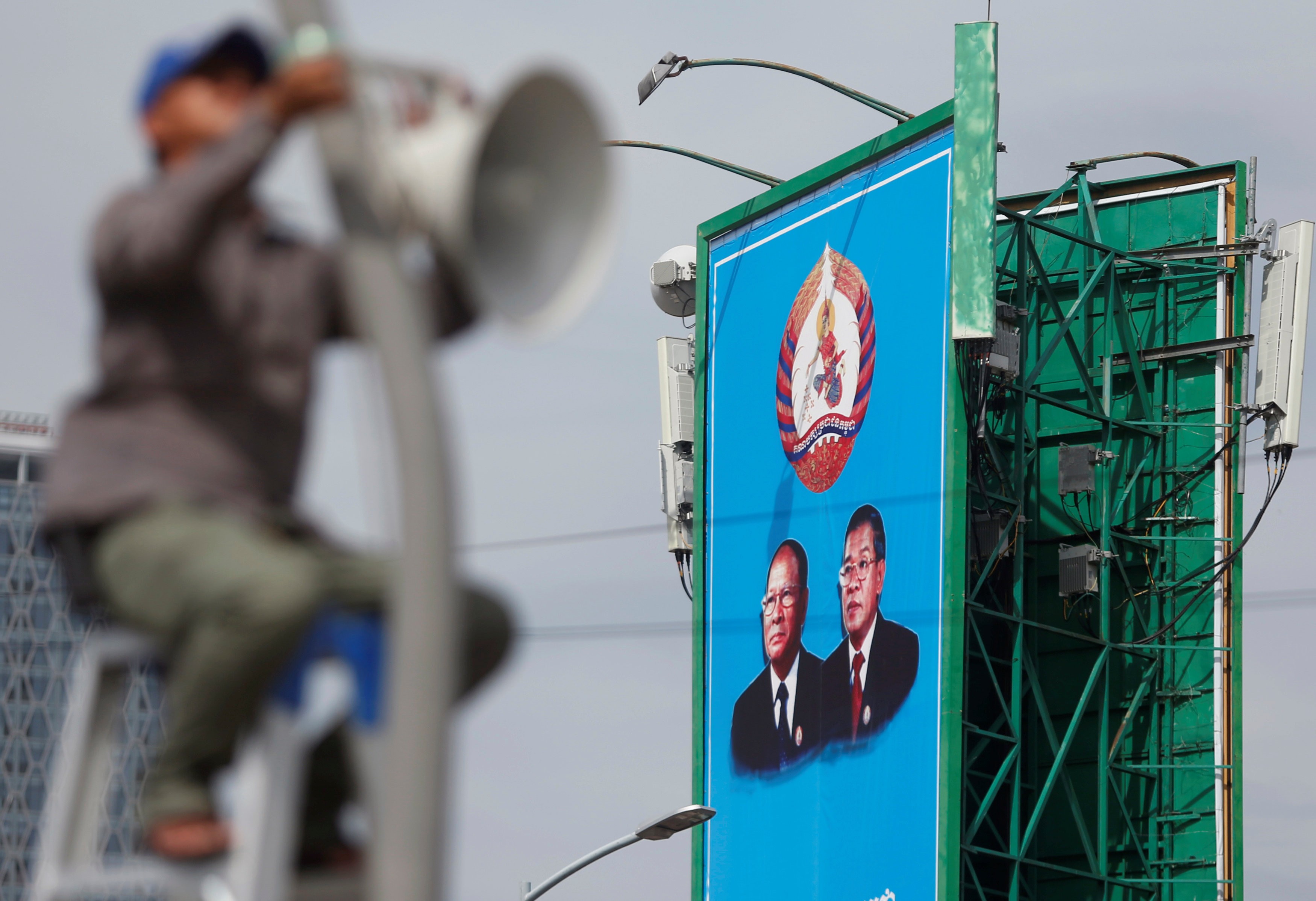 A poster of the Cambodian People's Party at a construction site in Phnom Penh. Photo: Reuters