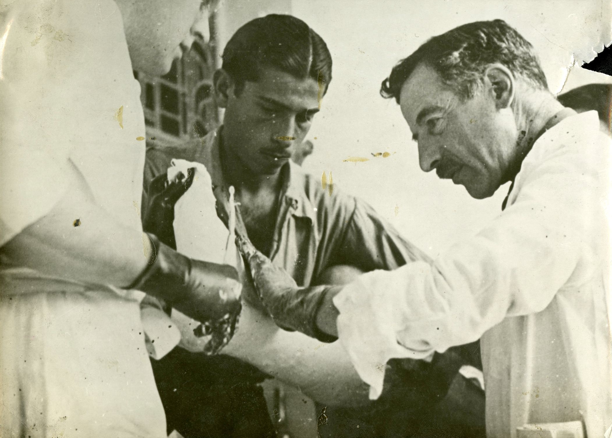 Dr Leo Eloesser (right) operating on a patient in Spain in 1937, at the height of the Spanish civil war. Picture: courtesy of the Tamiment Library, New York University